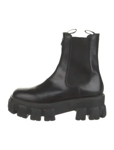 Pre-owned Prada Enameled Metal Triangle Leather Chelsea Boots In Black