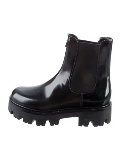 Pre-owned Prada Enameled Metal Triangle Leather Chelsea Boots In Black