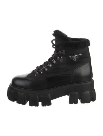 Pre-owned Prada Enameled Metal Triangle Leather Combat Boots In Black