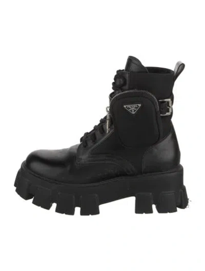 Pre-owned Prada Enameled Metal Triangle Leather Combat Boots In Black