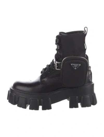 Pre-owned Prada Enameled Metal Triangle Leather Combat Boots In Black