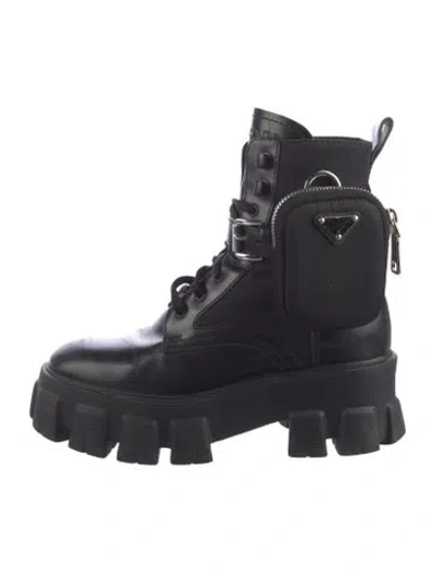 Pre-owned Prada Enameled Metal Triangle Leather Combat Boots In Black