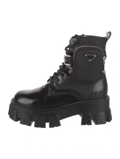 Pre-owned Prada Enameled Metal Triangle Leather Combat Boots In Black