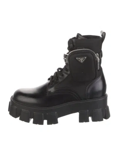 Pre-owned Prada Enameled Metal Triangle Leather Combat Boots In Black