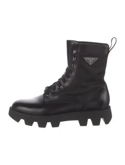 Pre-owned Prada Enameled Metal Triangle Leather Combat Boots In Black