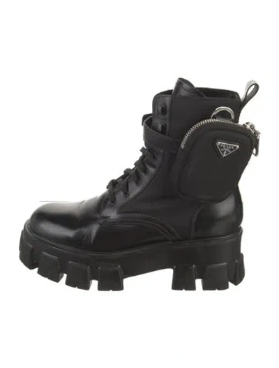 Pre-owned Prada Enameled Metal Triangle Leather Combat Boots In Black