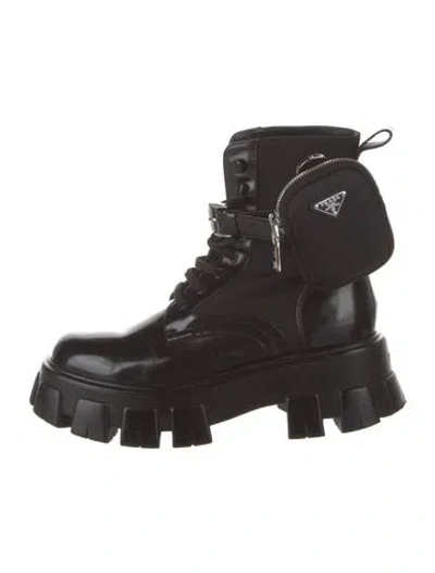 Pre-owned Prada Enameled Metal Triangle Leather Combat Boots In Black
