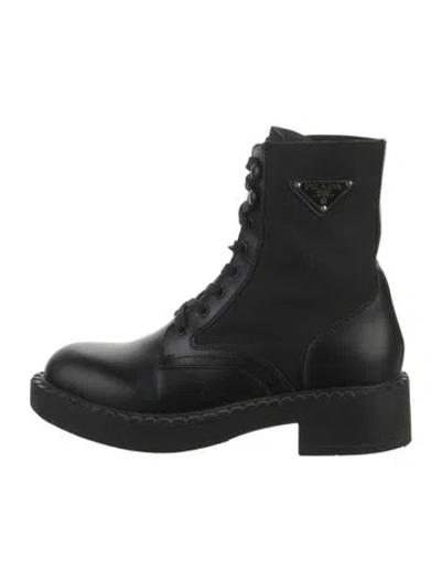 Pre-owned Prada Enameled Metal Triangle Leather Combat Boots In Black