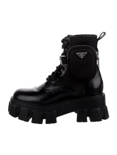 Pre-owned Prada Enameled Metal Triangle Leather Combat Boots In Black