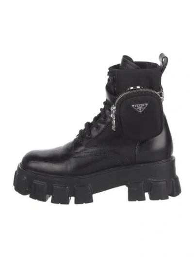 Pre-owned Prada Enameled Metal Triangle Leather Combat Boots In Black