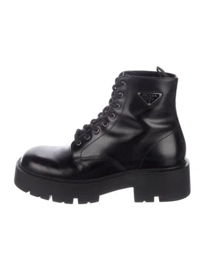 Pre-owned Prada Enameled Metal Triangle Leather Combat Boots In Black