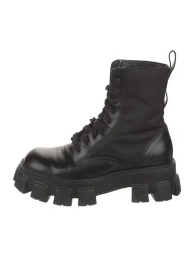 Pre-owned Prada Enameled Metal Triangle Leather Combat Boots In Black