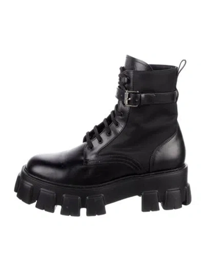 Pre-owned Prada Enameled Metal Triangle Leather Combat Boots In Black