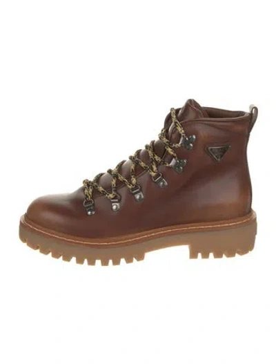 Pre-owned Prada Enameled Metal Triangle Leather Combat Boots In Brown