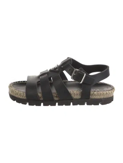 Pre-owned Prada Enameled Metal Triangle Leather Gladiator Sandals In Black