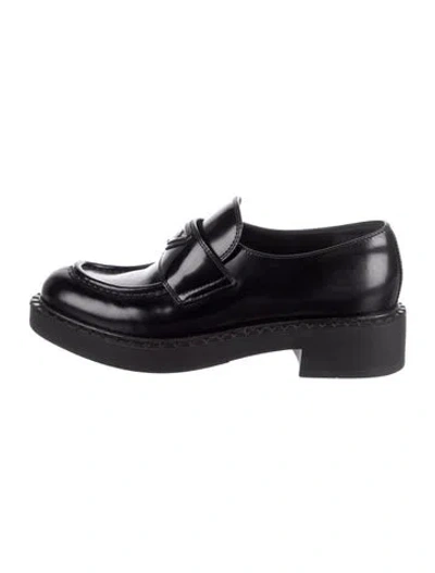 Pre-owned Prada Enameled Metal Triangle Leather Loafers In Black