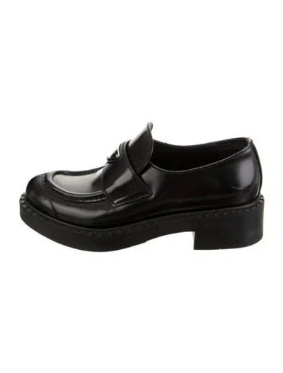 Pre-owned Prada Enameled Metal Triangle Leather Loafers In Black