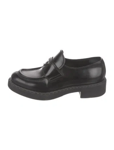 Pre-owned Prada Enameled Metal Triangle Leather Loafers In Black