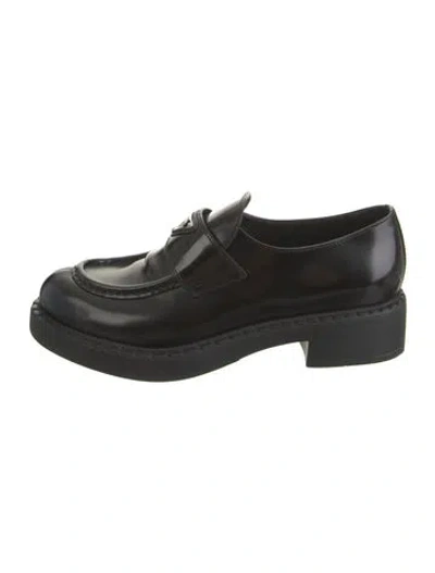 Pre-owned Prada Enameled Metal Triangle Leather Loafers In Black