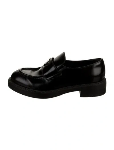 Pre-owned Prada Enameled Metal Triangle Leather Loafers In Black