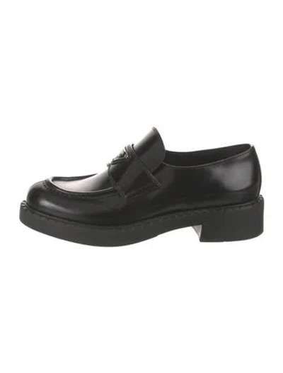 Pre-owned Prada Enameled Metal Triangle Leather Loafers In Black