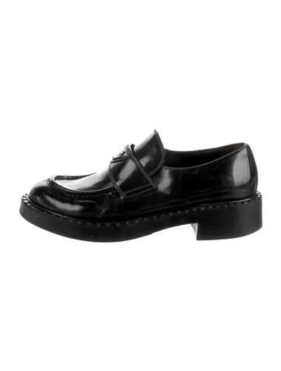 Pre-owned Prada Enameled Metal Triangle Leather Loafers In Black