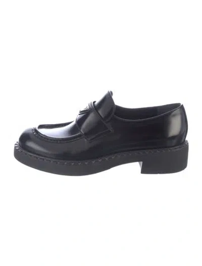 Pre-owned Prada Enameled Metal Triangle Leather Loafers In Black