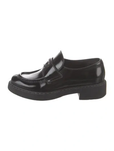 Pre-owned Prada Enameled Metal Triangle Leather Loafers In Black