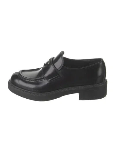 Pre-owned Prada Enameled Metal Triangle Leather Loafers In Black