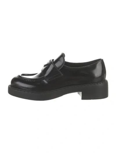 Pre-owned Prada Enameled Metal Triangle Leather Loafers In Black