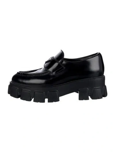 Pre-owned Prada Enameled Metal Triangle Leather Loafers In Black