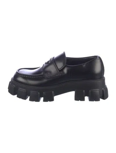 Pre-owned Prada Enameled Metal Triangle Leather Loafers In Black