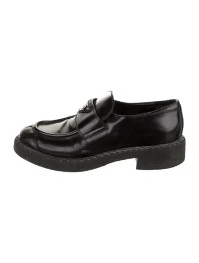 Pre-owned Prada Enameled Metal Triangle Leather Loafers In Black