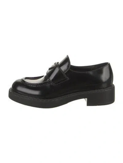 Pre-owned Prada Enameled Metal Triangle Leather Loafers In Black