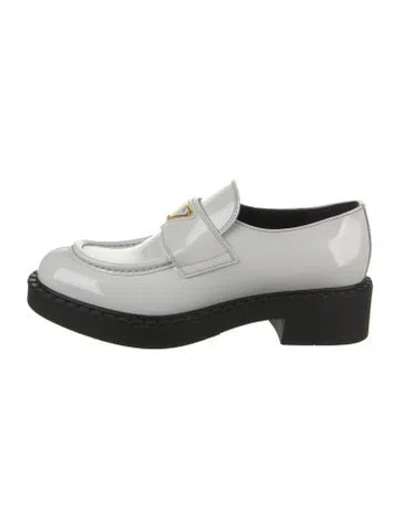 Pre-owned Prada Enameled Metal Triangle Leather Loafers In Black/white