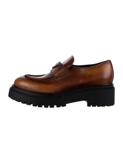 Pre-owned Prada Enameled Metal Triangle Leather Loafers In Brown