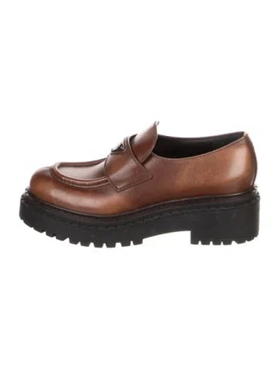 Pre-owned Prada Enameled Metal Triangle Leather Loafers In Brown