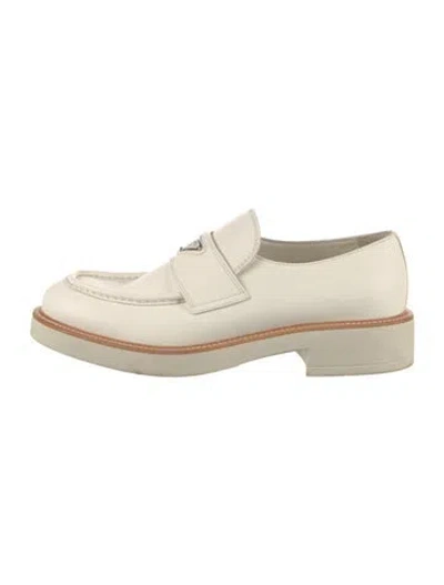 Pre-owned Prada Enameled Metal Triangle Leather Loafers In Neutral