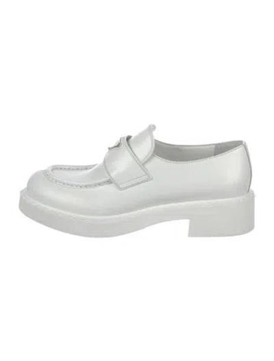 Pre-owned Prada Enameled Metal Triangle Leather Loafers In White