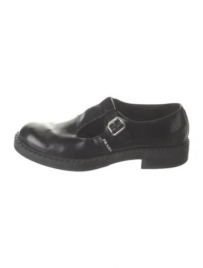 Pre-owned Prada Enameled Metal Triangle Leather Monk Straps In Black
