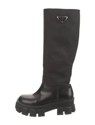 Pre-owned Prada Enameled Metal Triangle Leather Moto Boots In Black