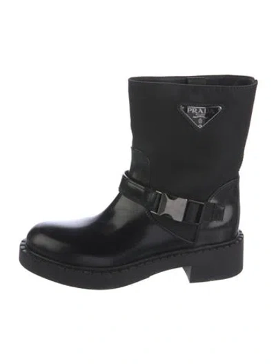 Pre-owned Prada Enameled Metal Triangle Leather Moto Boots In Black