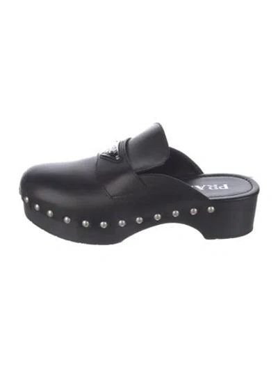 Pre-owned Prada Enameled Metal Triangle Leather Mules In Black