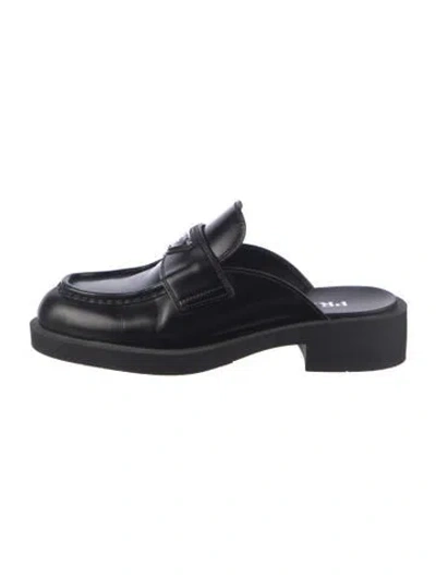 Pre-owned Prada Enameled Metal Triangle Leather Mules In Black