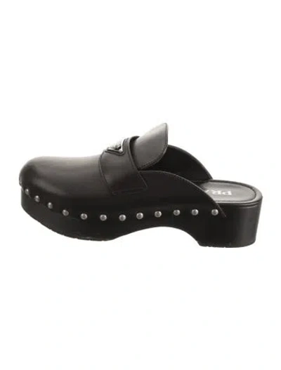 Pre-owned Prada Enameled Metal Triangle Leather Mules In Black