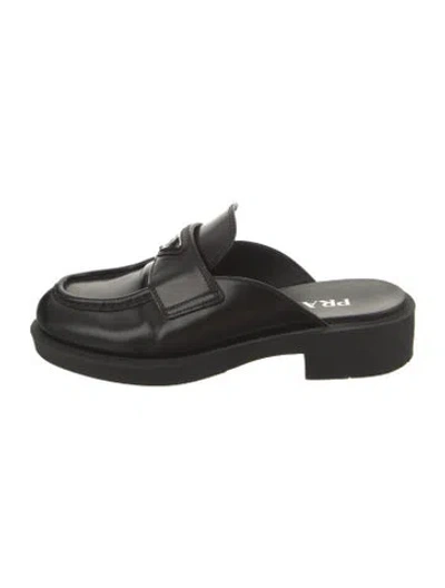 Pre-owned Prada Enameled Metal Triangle Leather Mules In Black