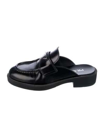 Pre-owned Prada Enameled Metal Triangle Leather Mules In Black