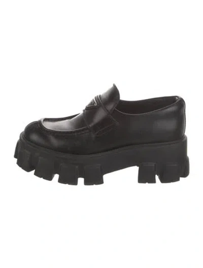 Pre-owned Prada Enameled Metal Triangle Leather Mules In Black