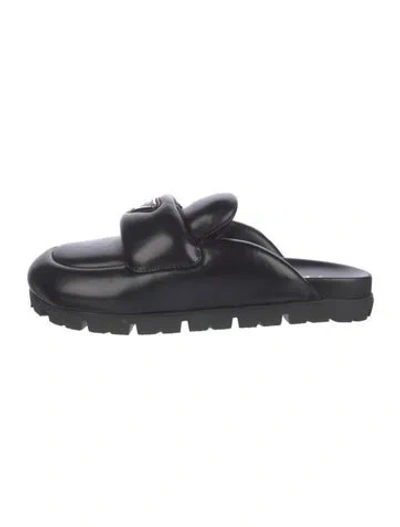 Pre-owned Prada Enameled Metal Triangle Leather Mules In Black