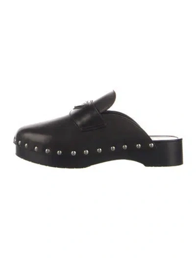 Pre-owned Prada Enameled Metal Triangle Leather Mules In Black